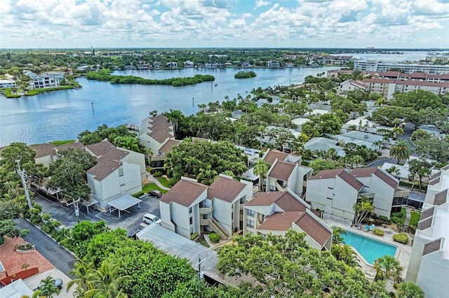 bird's eye view featuring a water view and a residential view