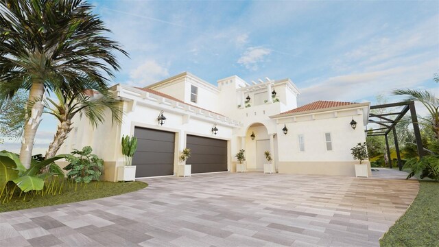 mediterranean / spanish house with a garage