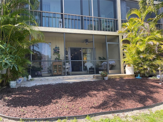 property entrance featuring a patio