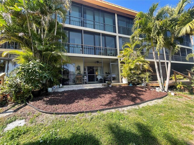 back of house with a patio area