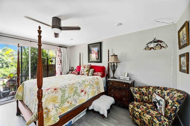 bedroom featuring hardwood / wood-style floors, access to exterior, and ceiling fan