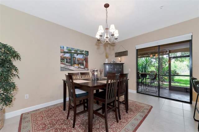 tiled dining area with a notable chandelier