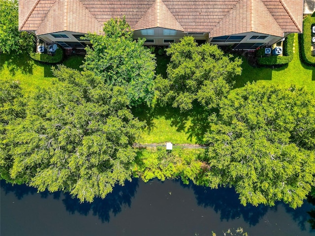 birds eye view of property featuring a water view