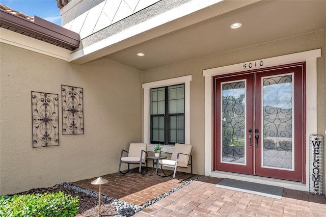 doorway to property featuring french doors