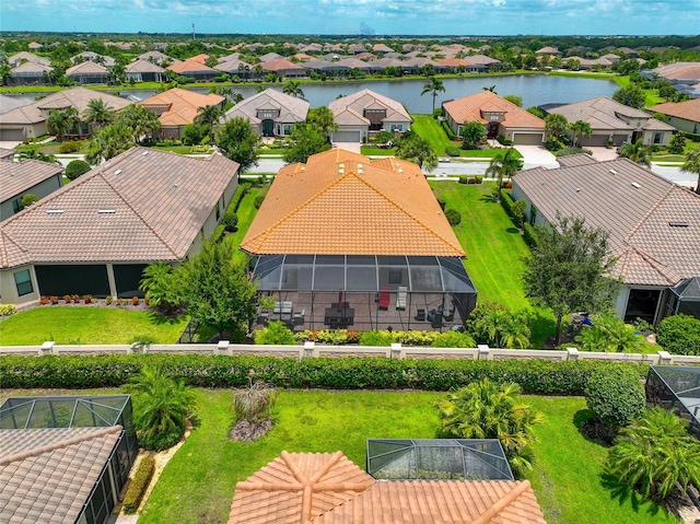 drone / aerial view with a water view