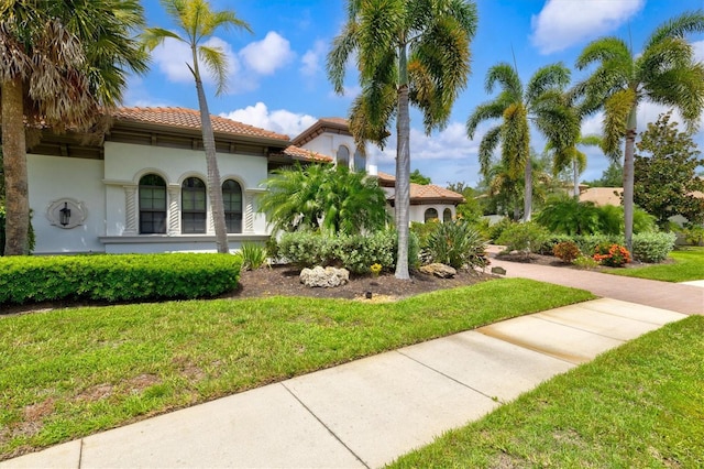 exterior space with a front lawn