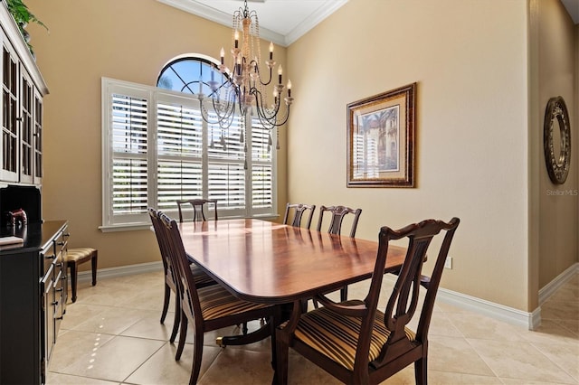 tiled dining area with a notable chandelier and ornamental molding