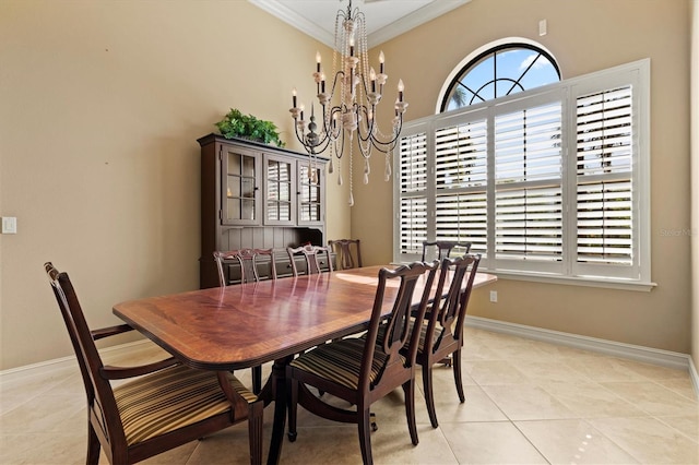 tiled dining area featuring a notable chandelier and crown molding