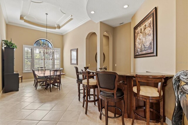 interior space with a raised ceiling