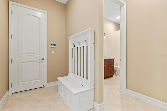 mudroom featuring light tile patterned flooring