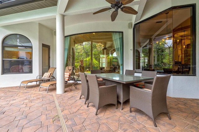 view of patio featuring ceiling fan