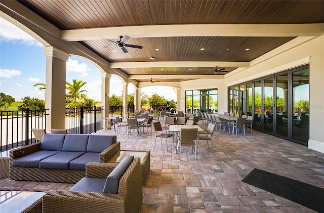 view of patio featuring ceiling fan and an outdoor living space