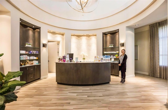 reception area with an inviting chandelier