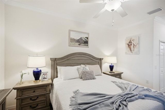 bedroom featuring crown molding and ceiling fan