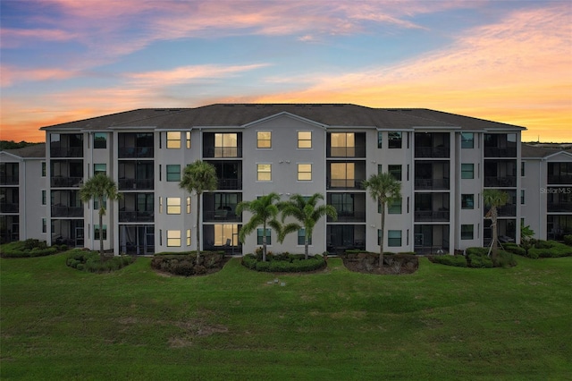 view of outdoor building at dusk