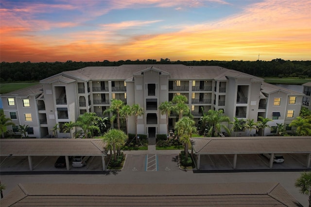 view of outdoor building at dusk