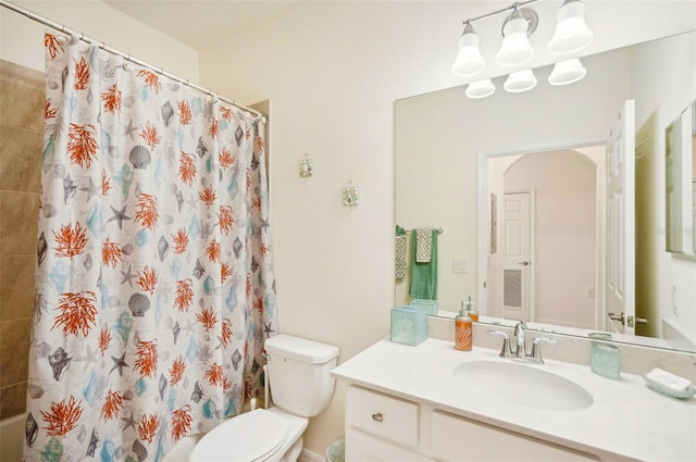 full bath featuring vanity, toilet, and shower / bath combo with shower curtain