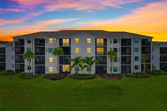 view of property at dusk