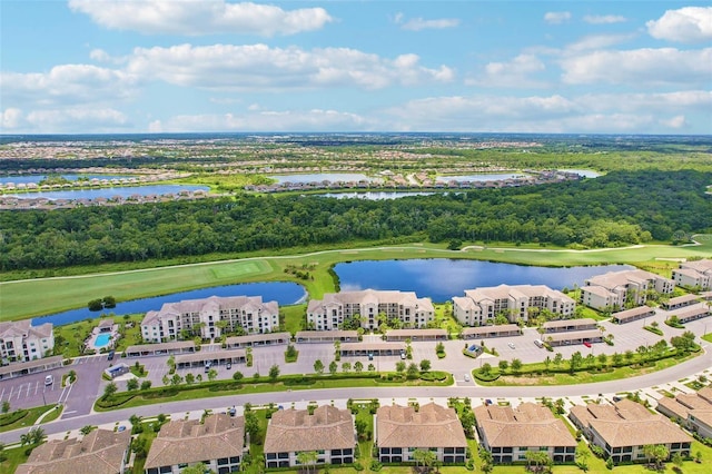 aerial view featuring view of golf course and a water view