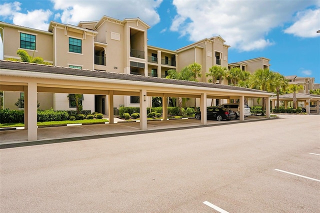 view of property with covered parking