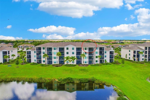 drone / aerial view featuring a water view