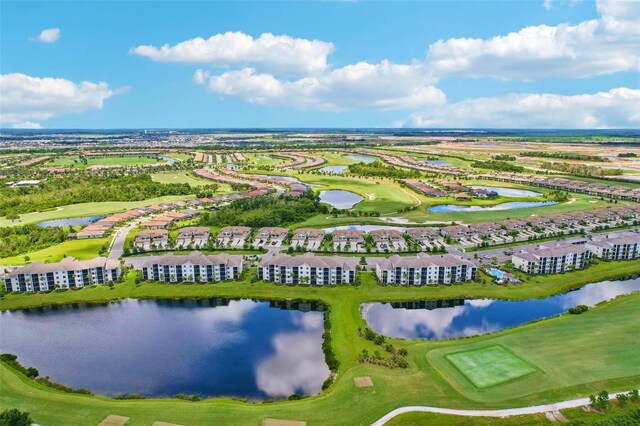 drone / aerial view featuring a water view and golf course view