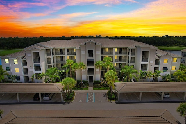 view of property at dusk