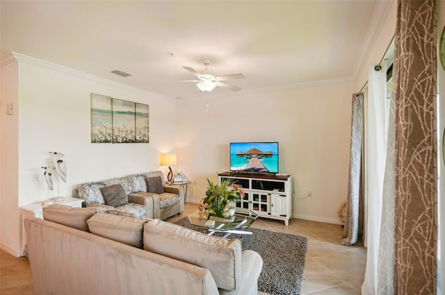 living room with light tile patterned floors, visible vents, baseboards, ceiling fan, and crown molding