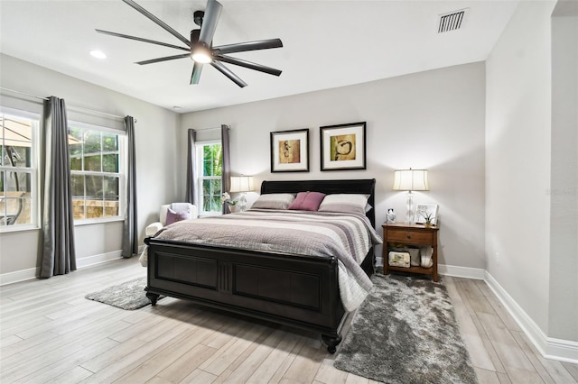 bedroom featuring ceiling fan and light wood-type flooring