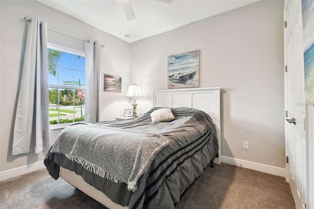 carpeted bedroom with ceiling fan