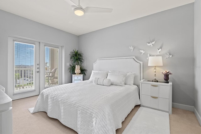 carpeted bedroom with access to outside, ceiling fan, and french doors