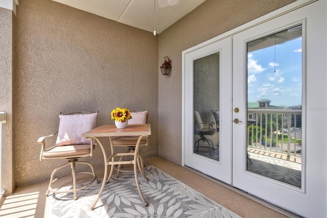 balcony featuring french doors