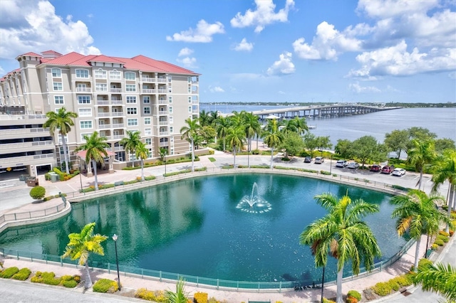 view of pool with a water view