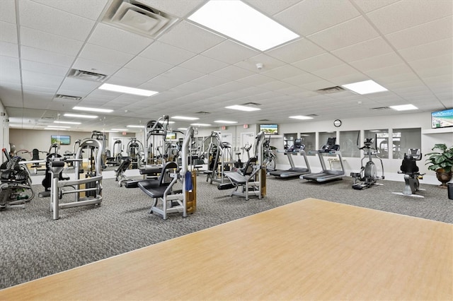 workout area with a drop ceiling