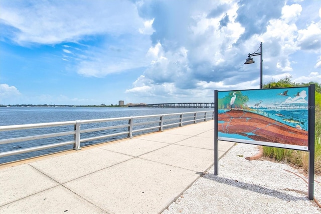 view of home's community featuring a water view