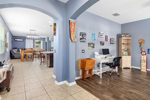 office space with hardwood / wood-style floors