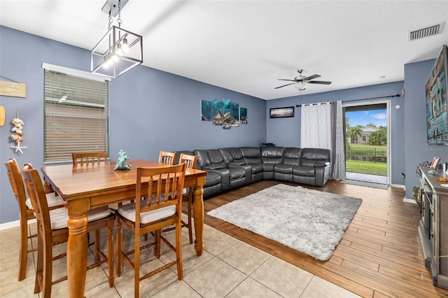 dining room with ceiling fan