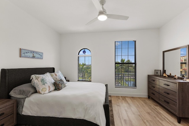 bedroom featuring light hardwood / wood-style floors and ceiling fan