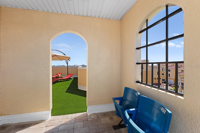 view of patio / terrace featuring a balcony