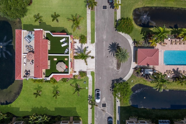 bird's eye view with a water view