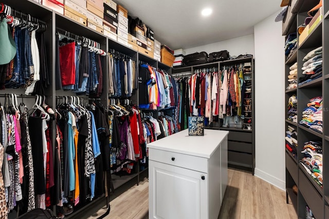 walk in closet featuring light wood-style floors