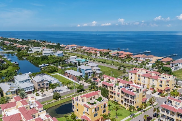 bird's eye view with a water view and a residential view