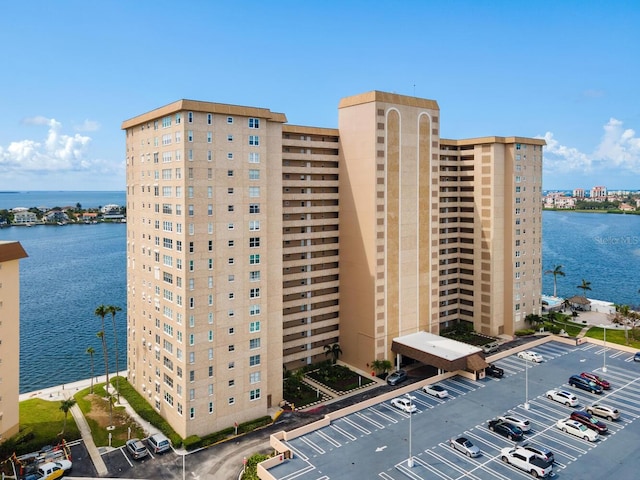 view of building exterior featuring a water view