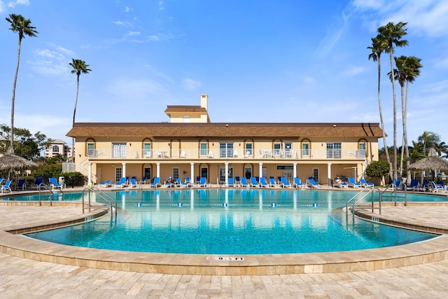 view of swimming pool featuring a patio area