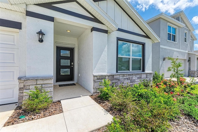 entrance to property featuring a garage