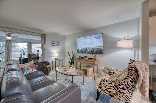 living room featuring carpet flooring and ceiling fan