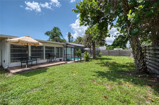 view of yard featuring a pool side deck