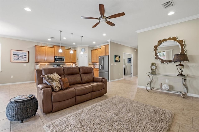 living room with a ceiling fan, recessed lighting, visible vents, and baseboards