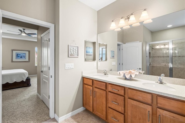 bathroom with double vanity, a stall shower, ensuite bath, and a sink