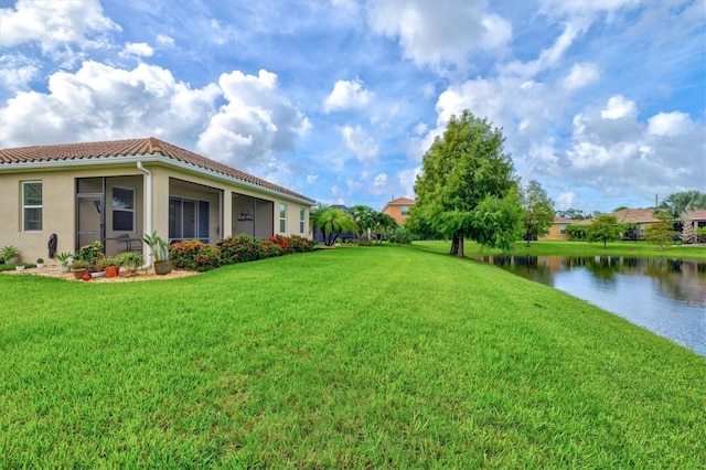 view of yard featuring a water view